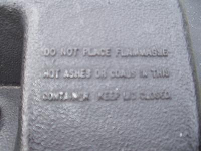 Hot ash warning on trash can