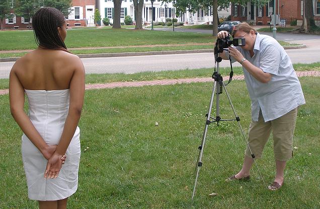 Ms T (Mrs. Desk) shooting Miss Hadassah